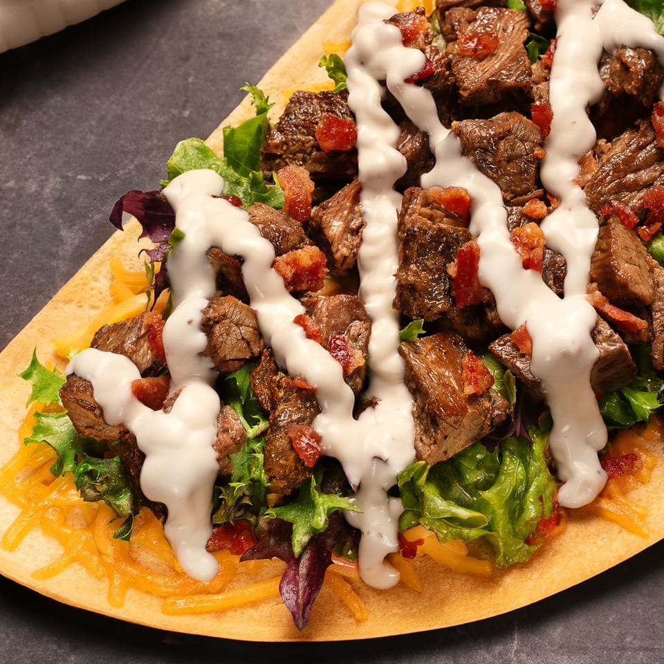 Steak crêpe with greens and creamy sauce